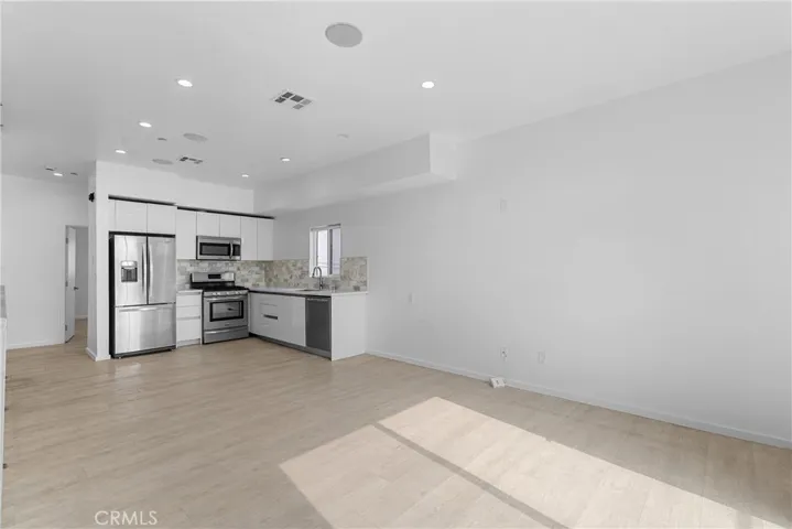 Kitchen to living room .