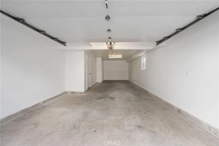 2 attached garage with extra storage.