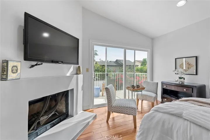 Primary Bedroom with balcony