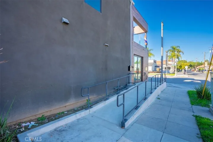 Exterior shot highlighting the modern facade and clean landscaping.