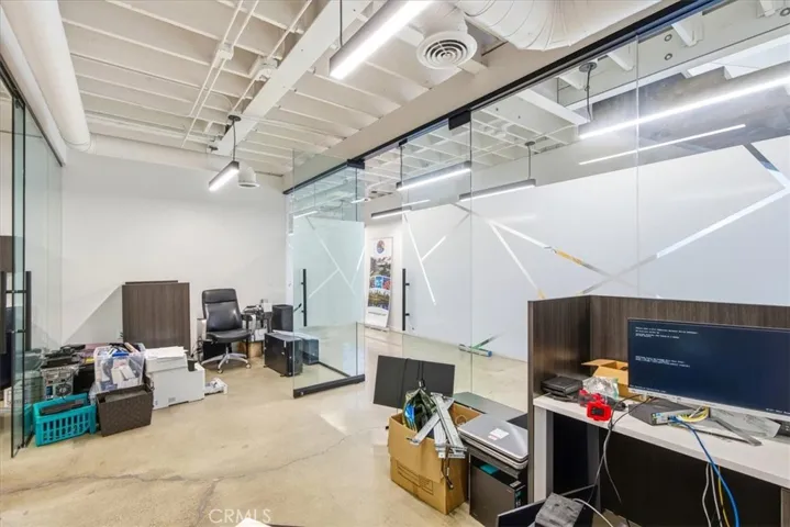 Spacious, flexible room perfect for an office or creative workspace.