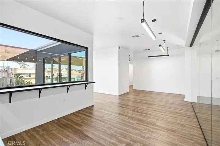 Floor-to-ceiling windows offering unobstructed views and abundant natural light.