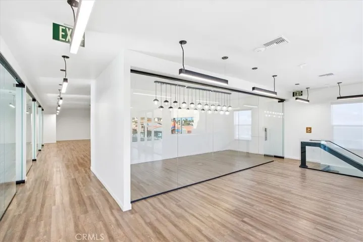 Modern kitchen and workspace with clean lines and high-end finishes.