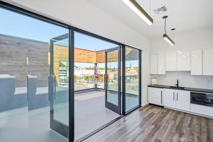 Seamless indoor/outdoor flow with expansive windows offering stunning views.