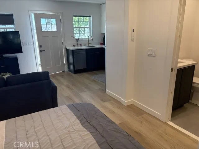 View from the bed to the kitchen.