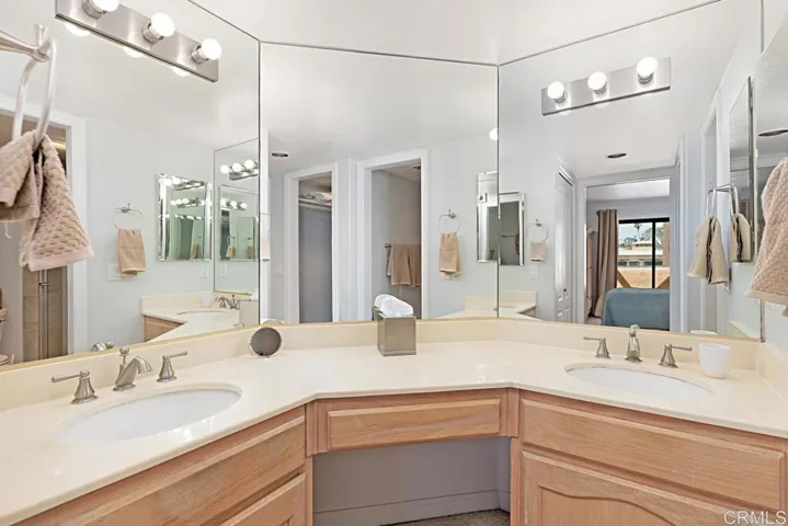 Primary bath with dual sinks. Walk in Closet