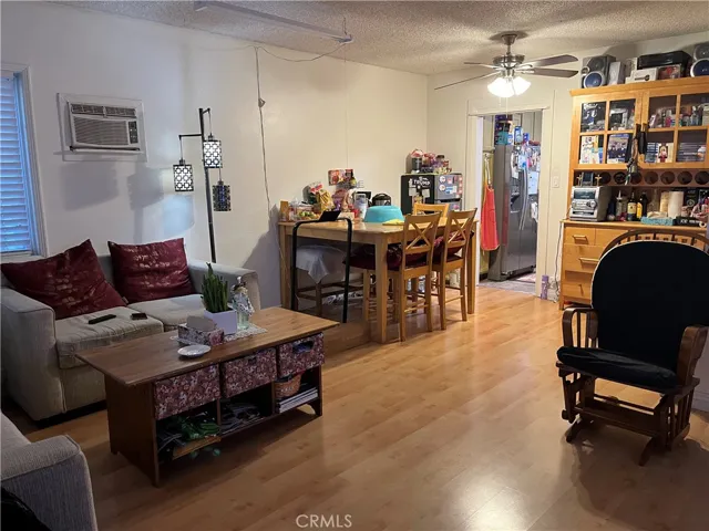 Living Room and Dining Area (Photo taken 1 year ago)