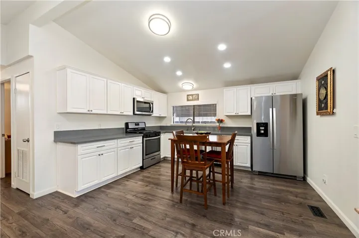 Upgrade Alert! Recessed Lights and Stainless Steel Appliances.