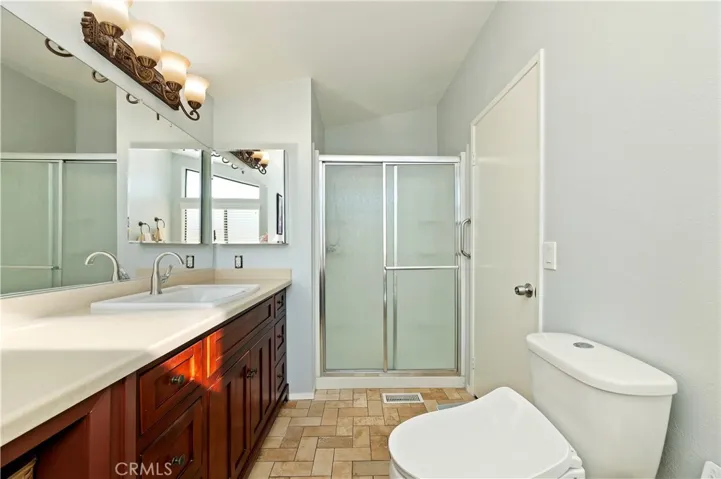 Walk-in shower and tile floors. Upgraded hardware.
