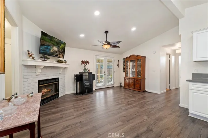 Family Room with Fireplace and French Doors to Backyard