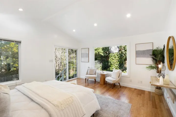 Bedroom featuring light wood finished floors and recessed lighting