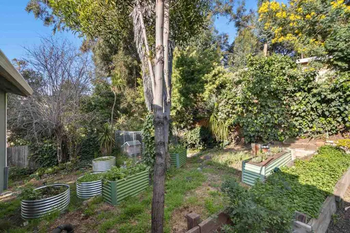 View of yard with a garden