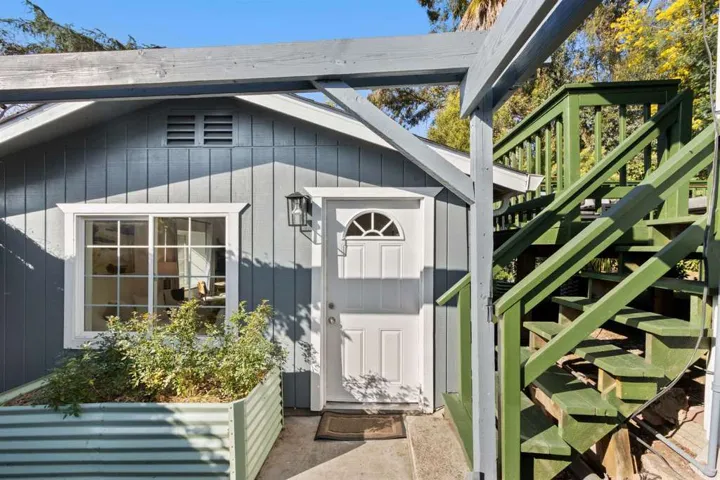 Entrance to property with board and batten siding