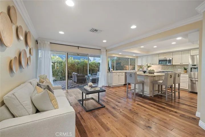 Family room oversees the beautiful backyard.