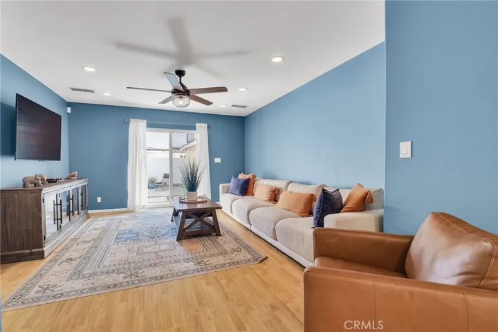 Spacious Family Room, Recessed Lighting, Ceiling Fan & Sliding Door Leading to Rear Yard.