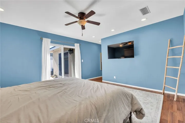Another Interior View of the Primary Bedroom of Sliding Door Leading to Rear Yard.