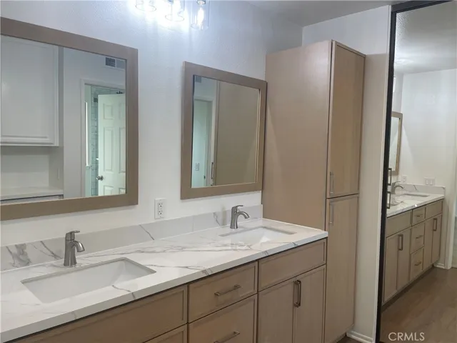 Primary bath with double sinks and storage