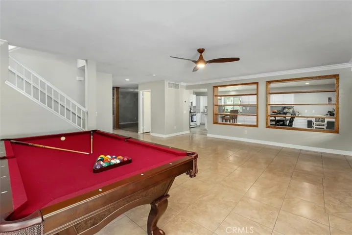 The Family Room looks into the light and bright Kitchen.