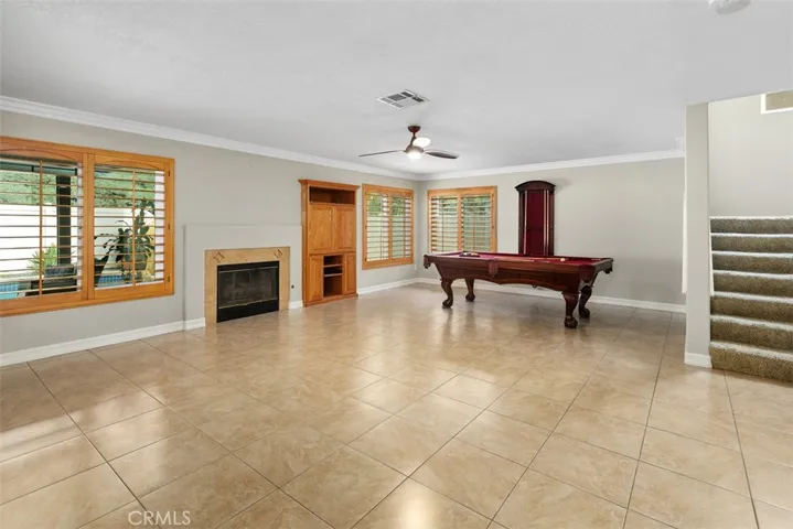 Spacious Family Room with Fireplace with Views to the Backyard!