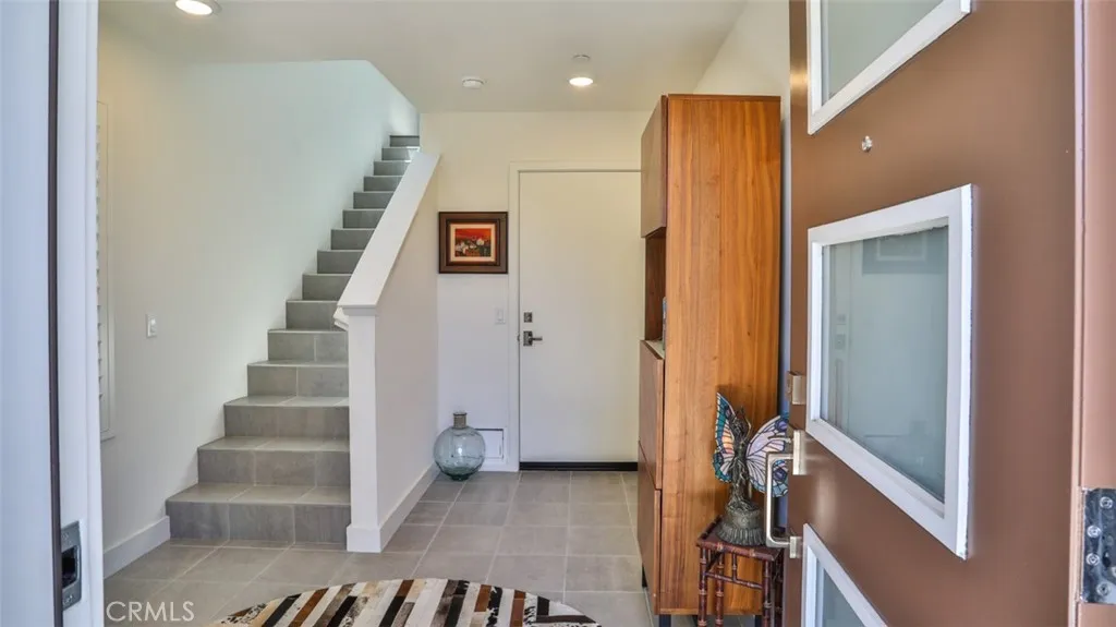 Foyer off of front patio and direct access from attached 3-car garage. Foyer off of front patio and direct access from attached 3-car garage.
