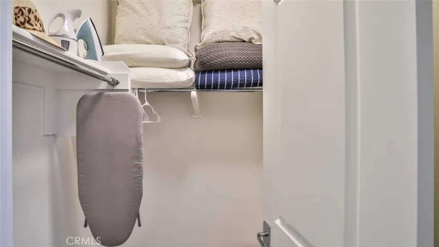 Secondary bedroom with walk-in closet and next to full hall bathroom.