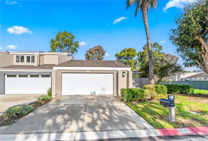 Long driveway and 2 car garage.