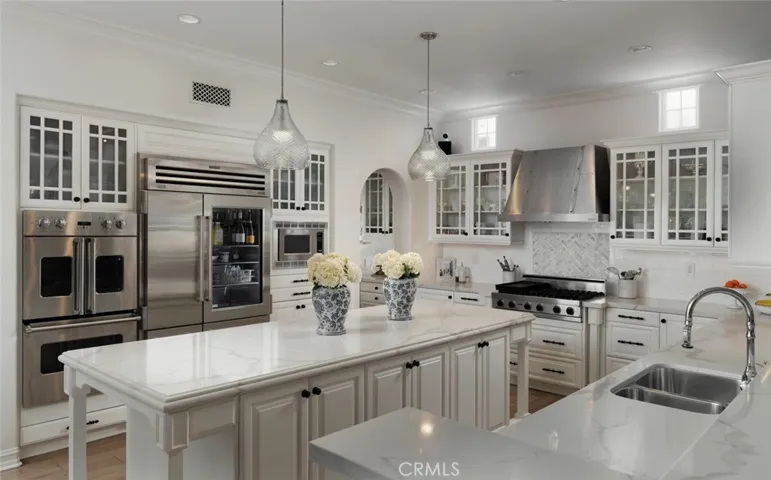 Chef's Kitchen with quartz counters and oversized Island