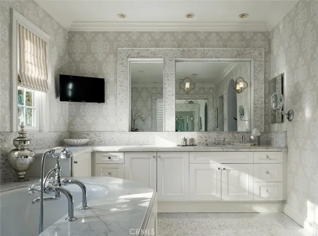 Upstairs: Primary bathroom with TV