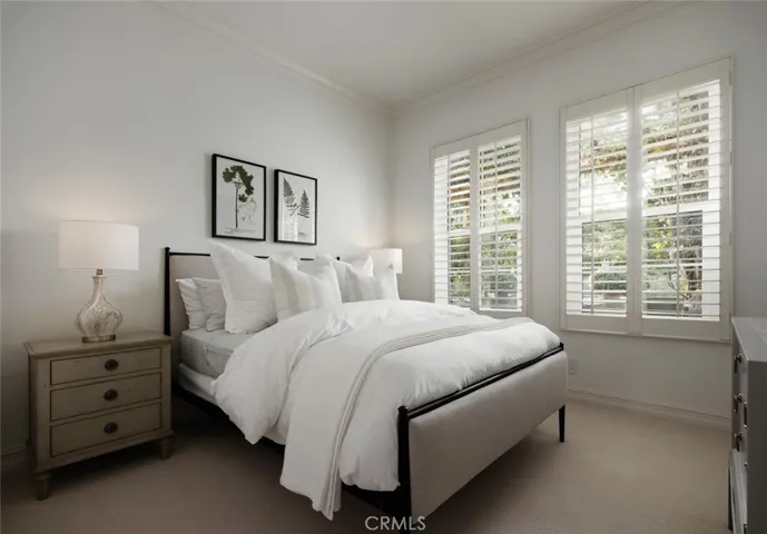 Downstairs: Guest bedroom with TV and en suite bathroom