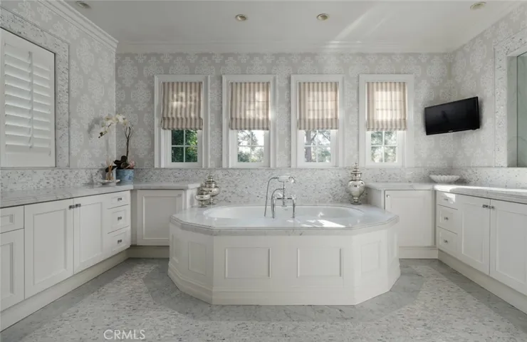 Upstairs: Primary remodeled bathroom and  Tub with Waterworks fixtures