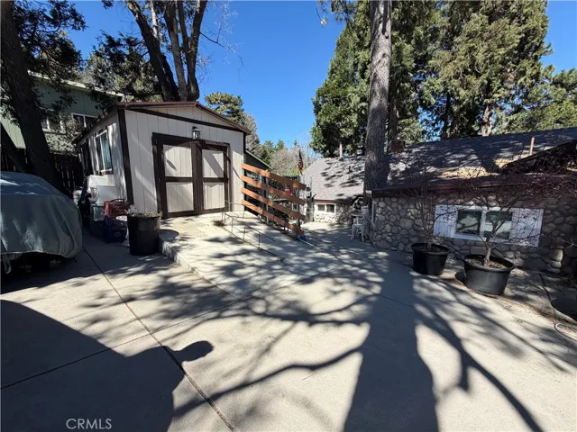 This is the driveway on Playground Drive and this is a storage shed on the driveway.