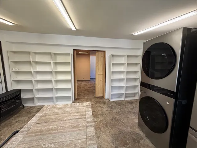 This is the studio guest house that is attached to the main house to the left side of the main house.  It has barn doors that divide this kitchen from the murphy bedroom.  This space was designed for wheel chair access.  This is a 1br/1ba., 300 feet approx size.