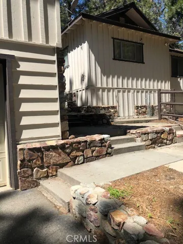 Paved walkways to every unit and all units have a private fenced yard including the hens!