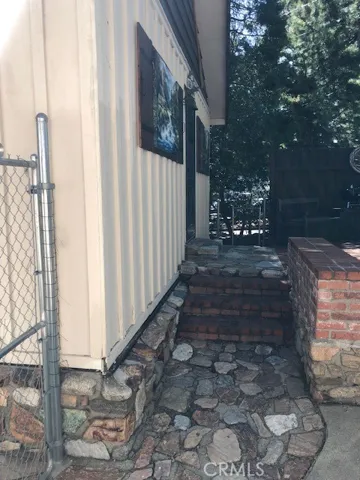 This is the Studio behind the garage and it does not have any garage door access.