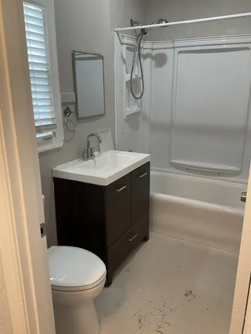 Full bathroom with vanity and shower / bath combination