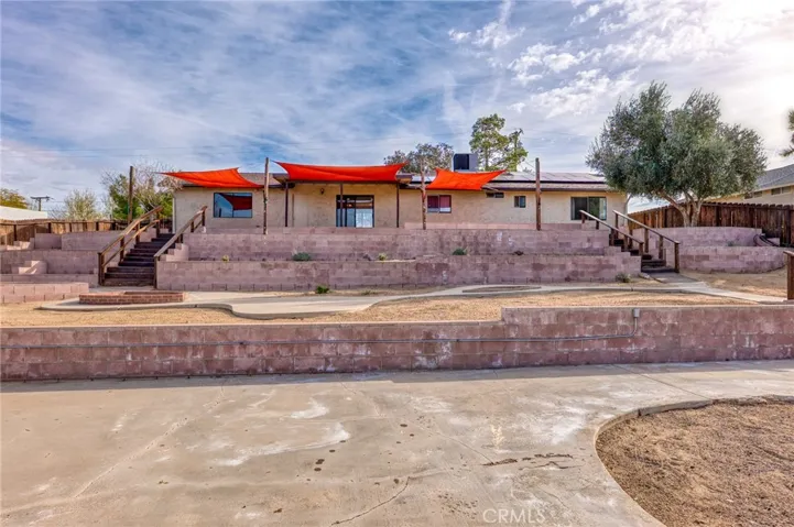 Beautifully terraced back yard with views.