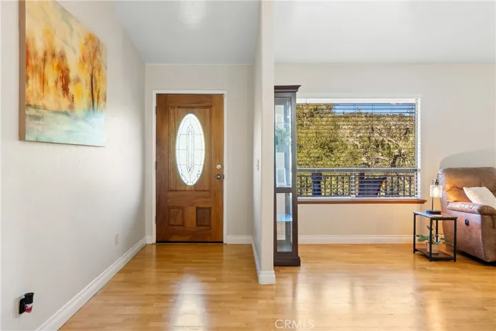 Stepping inside you are welcomed by handsome hardwood floors.