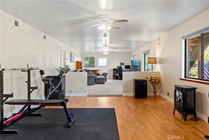 The entire downstairs is a huge bonus area. It is currently divided up into two separate areas but offers many possibilities.