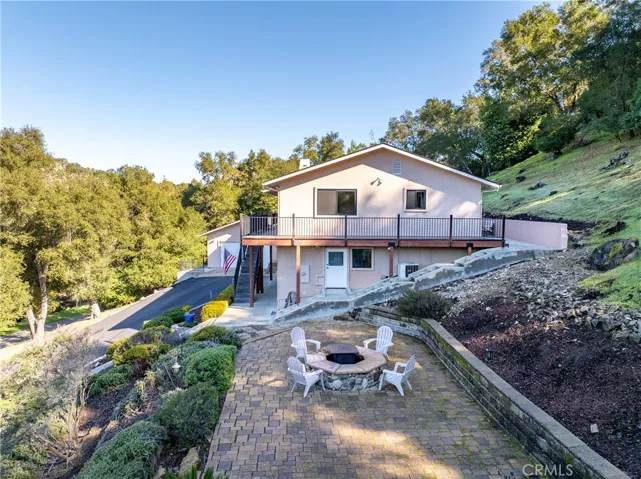 Stairs and concrete pathways lead you all around the home.