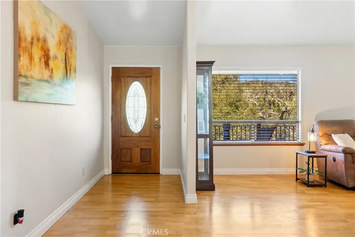 Stepping inside you are welcomed by handsome hardwood floors.