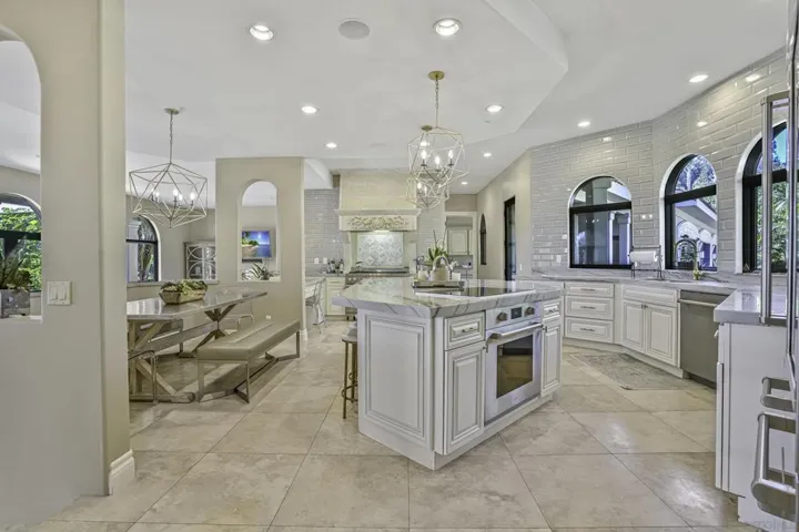 The ultimate chef's kitchen  has been tastefully remodeled and includes both Wolf gas range with griddle and Wolf induction cooktop and additional Wolf oven.