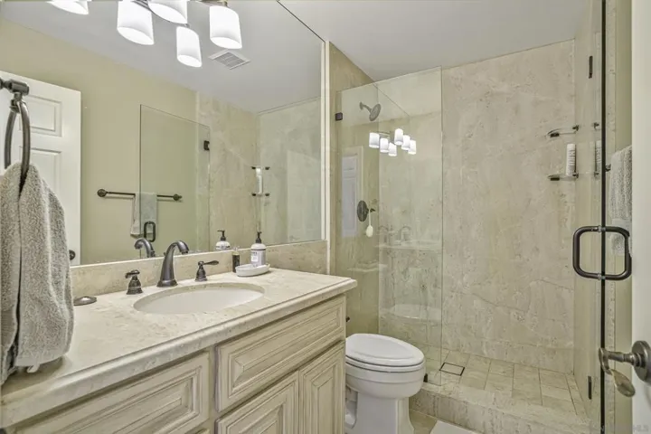 Another of the secondary bedroom's baths