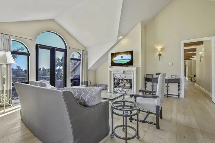 Secondary primary suite has nice sitting area, fireplace and wonderful view from the balcony