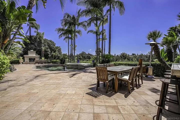 Great entertaining deck , dining area and pool and spa
