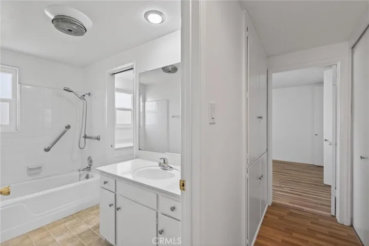Bathroom with tub and shower