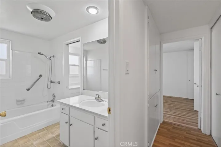 Bathroom with tub and shower