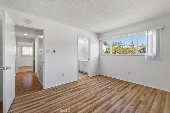 Bedroom 2 with entrance to half bath