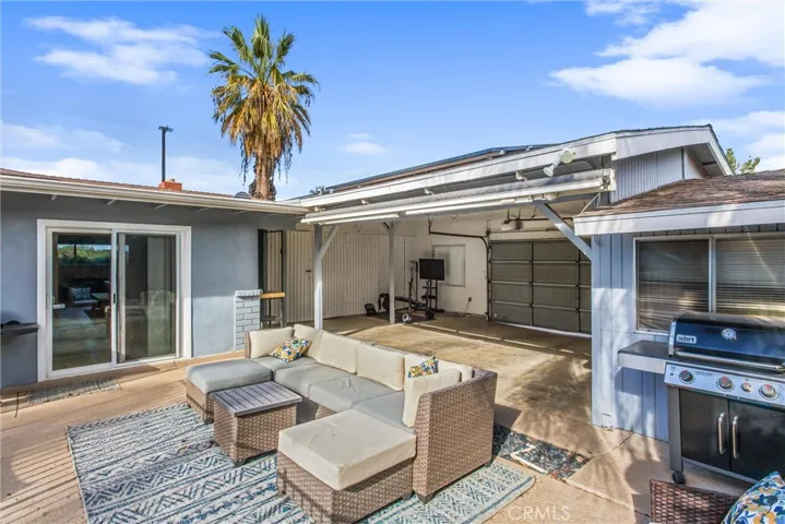 retractable awing covers the patio area