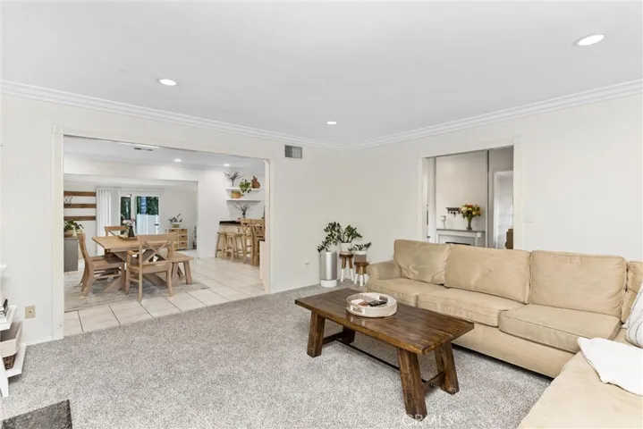 Open to dining and kitchen