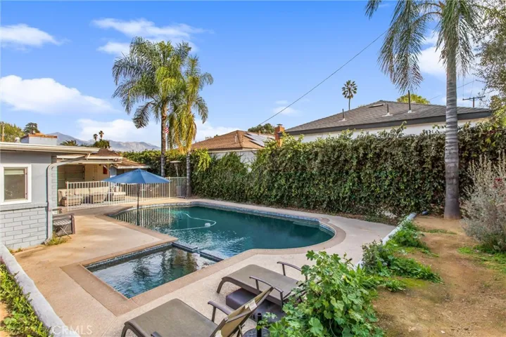 pebble tech pool and spa  completely fenced